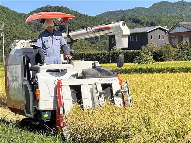 写真：お米農家の武市としくんです